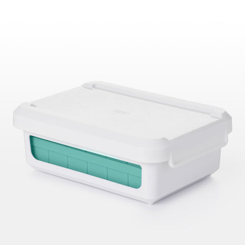 Stackable trays save freezer space and keep cubes organized.