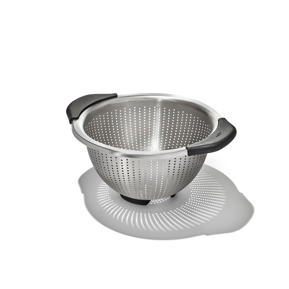 OXO Good Grips colander close-up highlighting elevated handles for secure rinsing