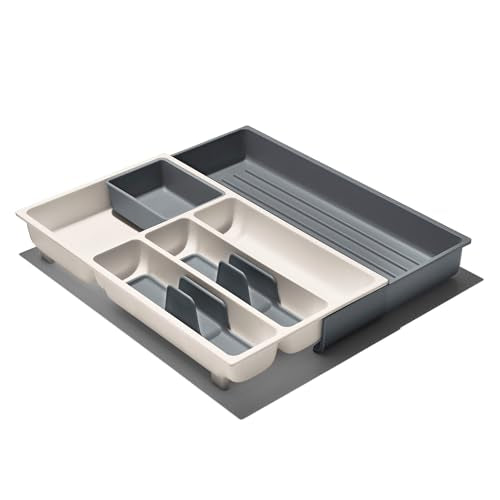 OXO Good Grips utensil caddies neatly stacked in a drawer for easy access.