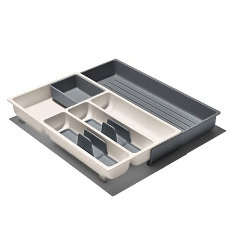 OXO Good Grips utensil caddies neatly stacked in a drawer for easy access.