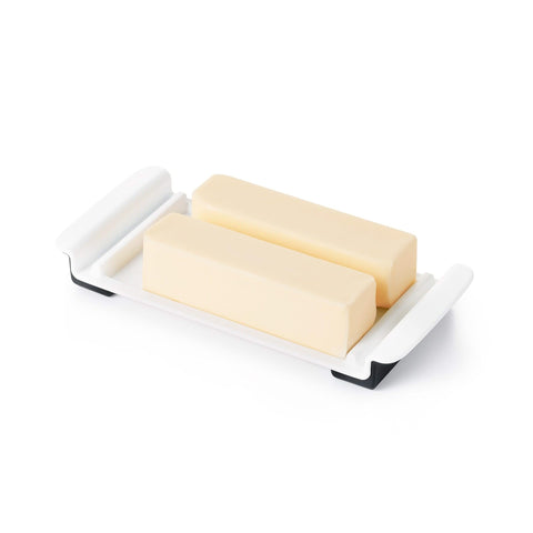 OXO Good Grips Wide Butter Dish stoppers secure butter during slicing.