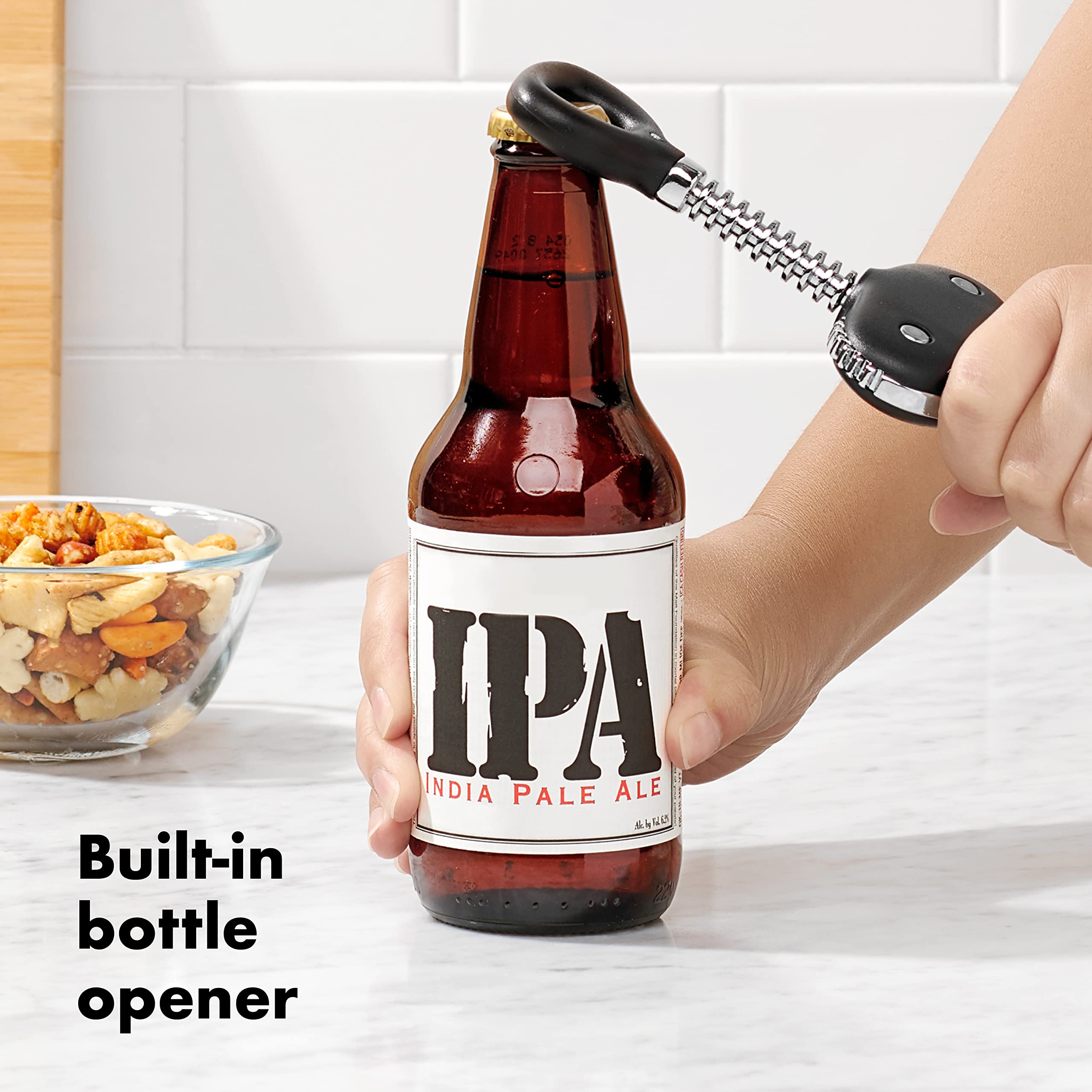 OXO Good Grips Winged Corkscrew stays stable on any bottle for quick use.