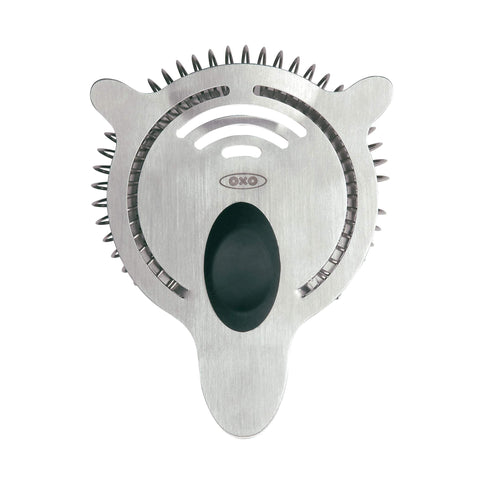 OXO SteeL cocktail strainer with raised lip prevents drips during pouring.
