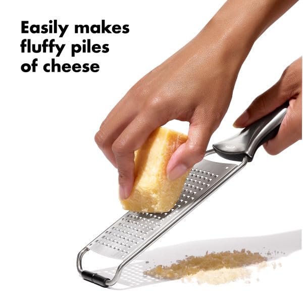 OXO Steel Grater delivering lemon zest for bright homemade dressings.