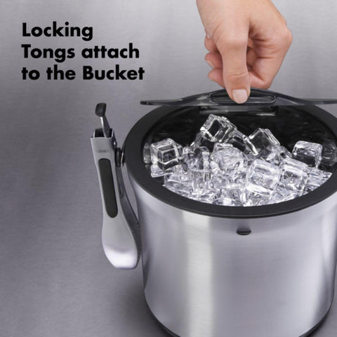 OXO locking tongs attach to bucket sides for secure ice grabbing.
