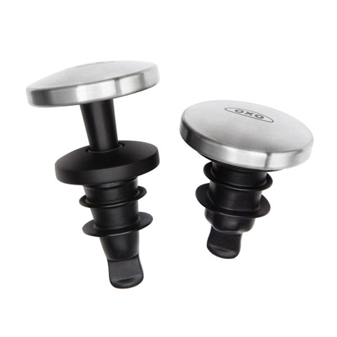 OXO SteeL wine stopper seals bottle to preserve freshness.