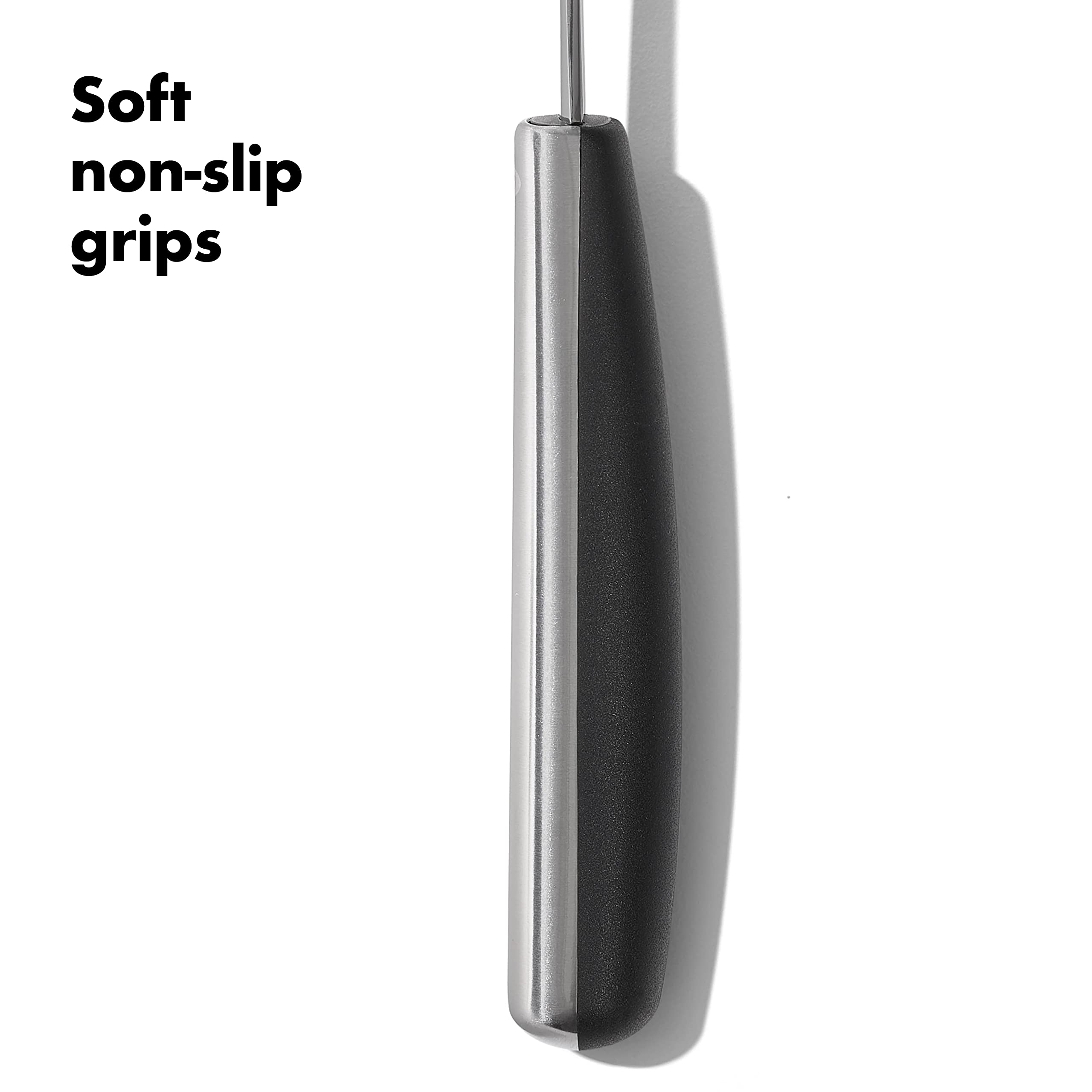 OXO Steel 15-piece fish turner lifting delicate fillets.