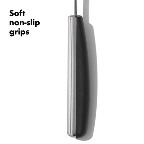 OXO Steel 15-piece fish turner lifting delicate fillets.