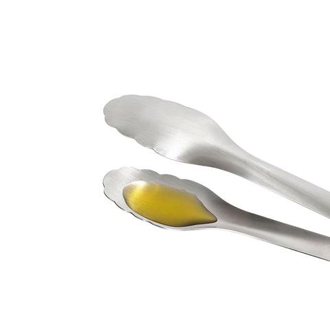 OXO Steel Serving Tongs in dishwasher-safe design for quick cleanup after meals.