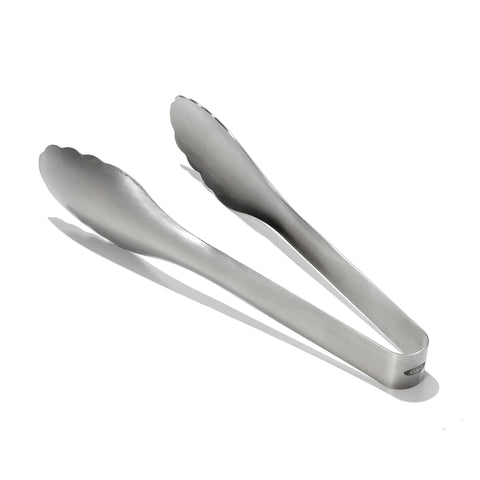 OXO Steel Serving Tongs with scalloped heads offer secure grip for salads and pasta servings.