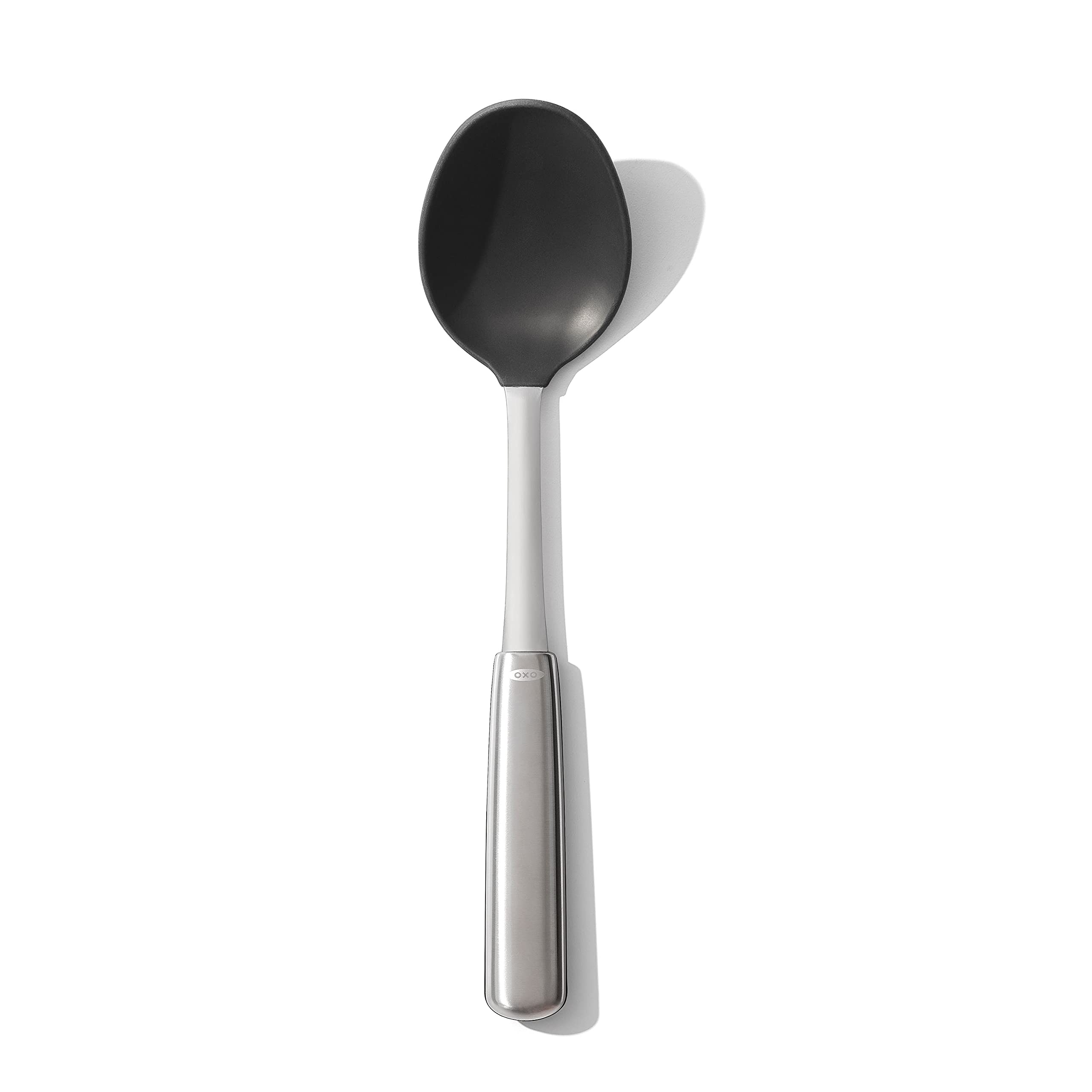 OXO steel silicone cooking spoon head close-up for safe non-stick stirring