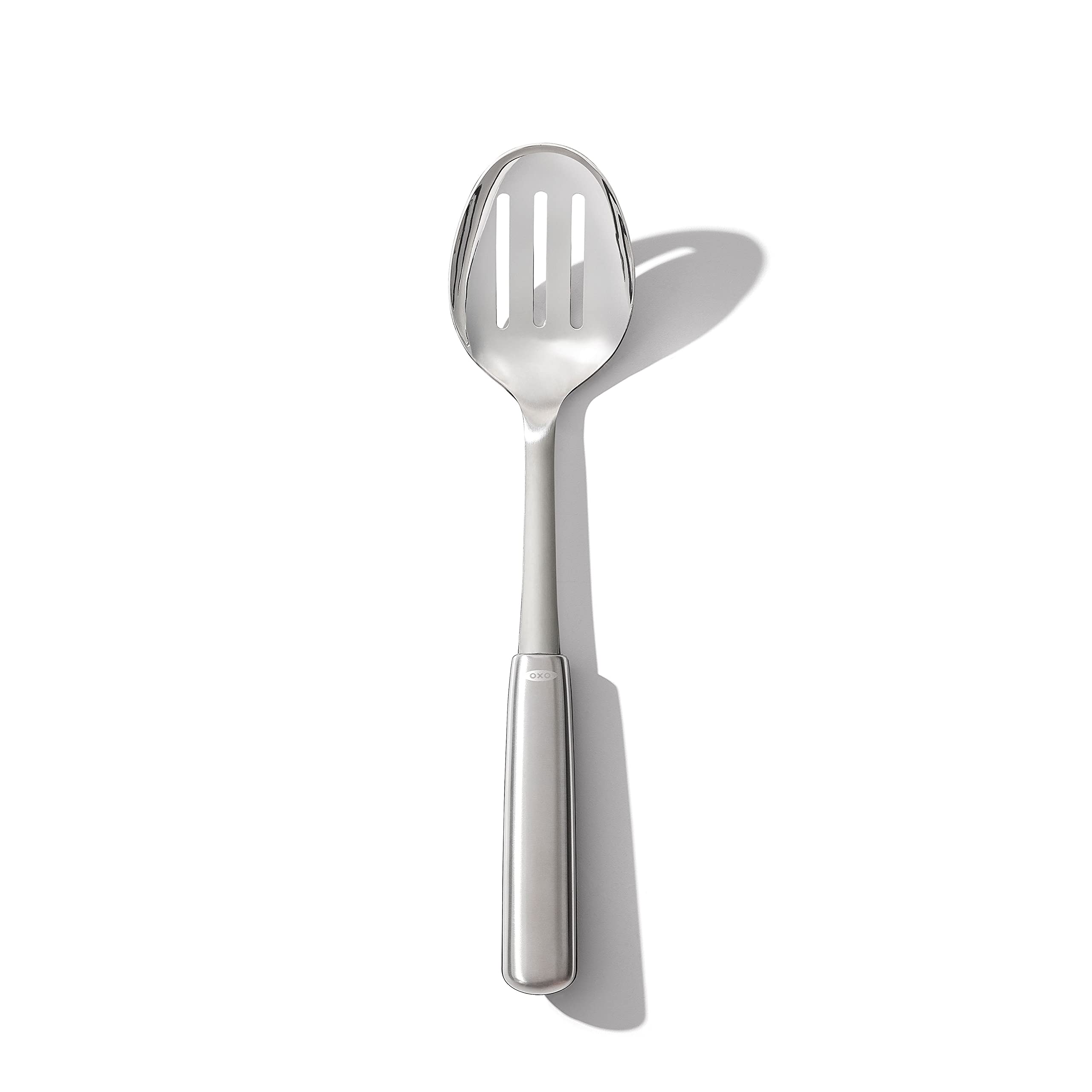 OXO Steel Slotted Cooking Spoon close-up shows durable stainless steel for everyday use