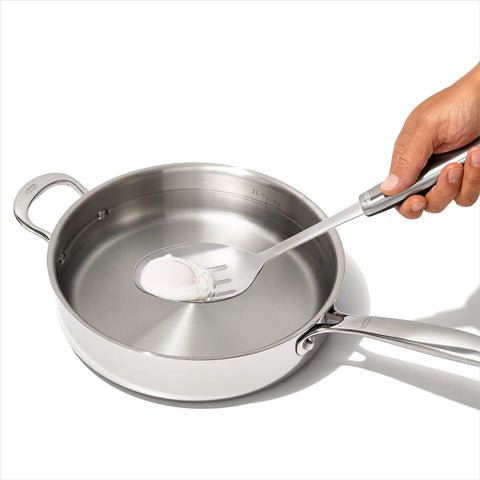 OXO Steel Slotted Cooking Spoon scoops meatballs from sauce without dripping