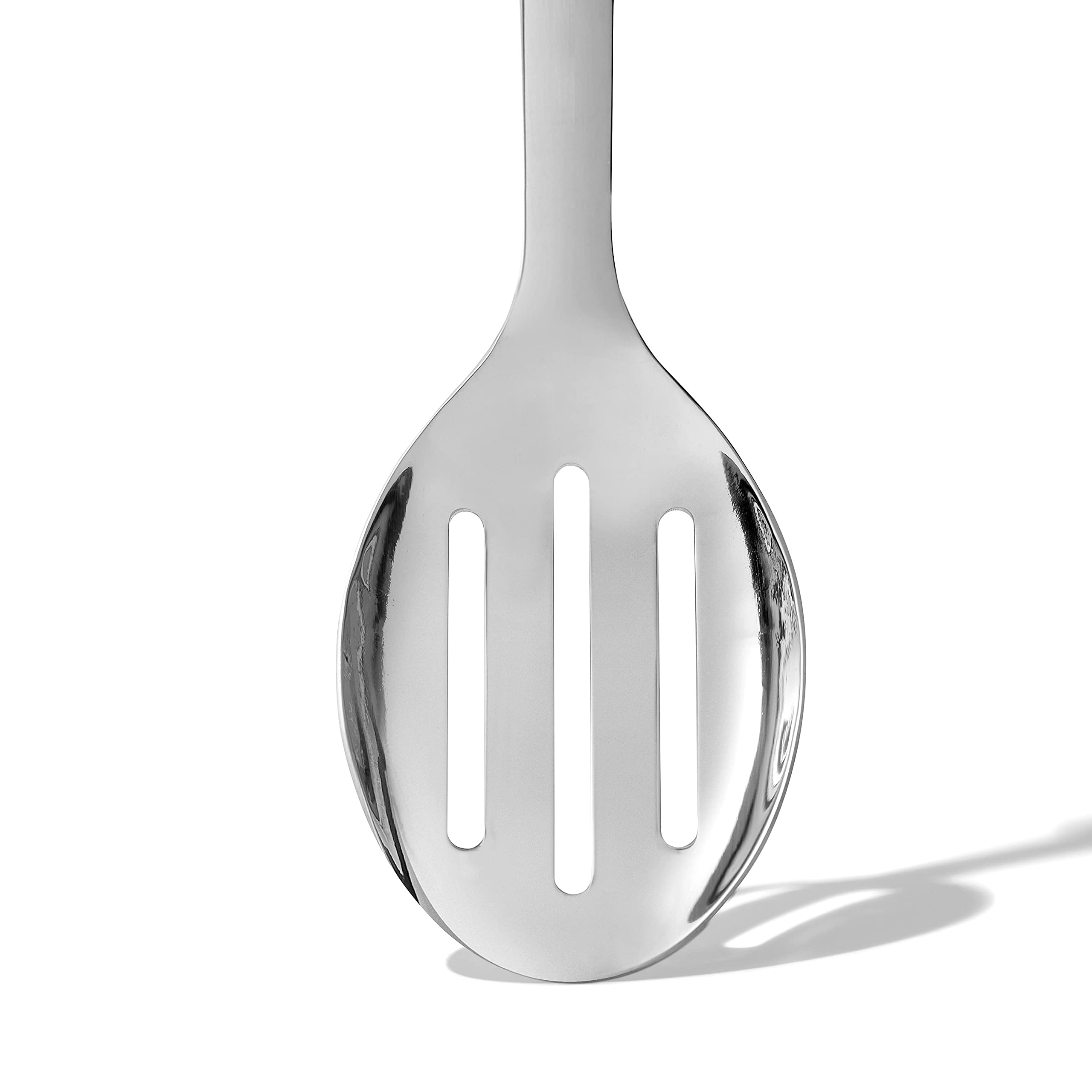 OXO Steel Slotted Serving Spoon with a sturdy contoured handle for comfortable cooking