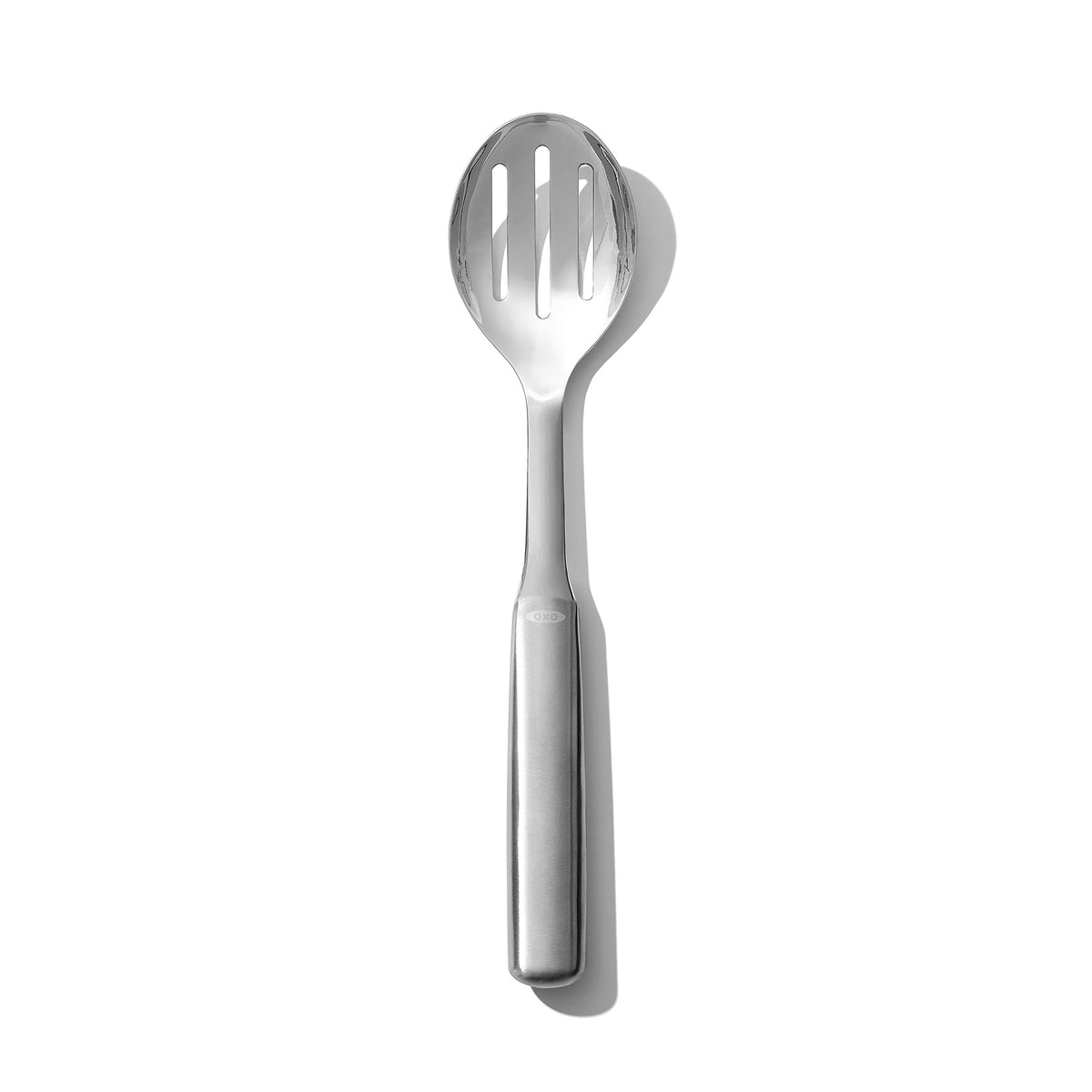 OXO Steel Slotted Serving Spoon top view highlighting drainage slots for liquids