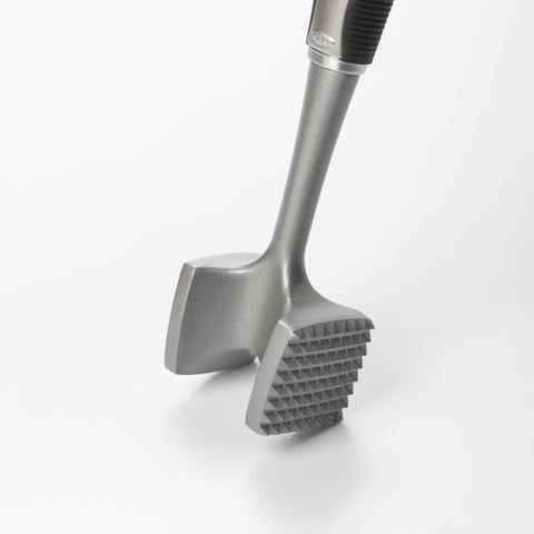 OXO SteeL tenderizer shows solid aluminum construction for durable pounding.