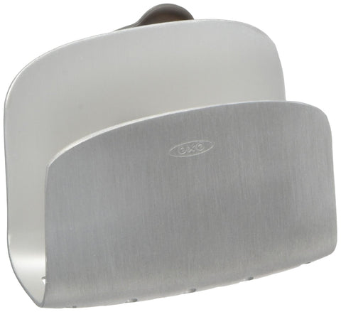 OXO SteeL suction sponge holder mounted to sink wall for a tidy counter