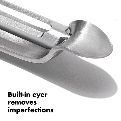 OXO Steel Swivel Peeler on a clean kitchen surface signals premium quality.
