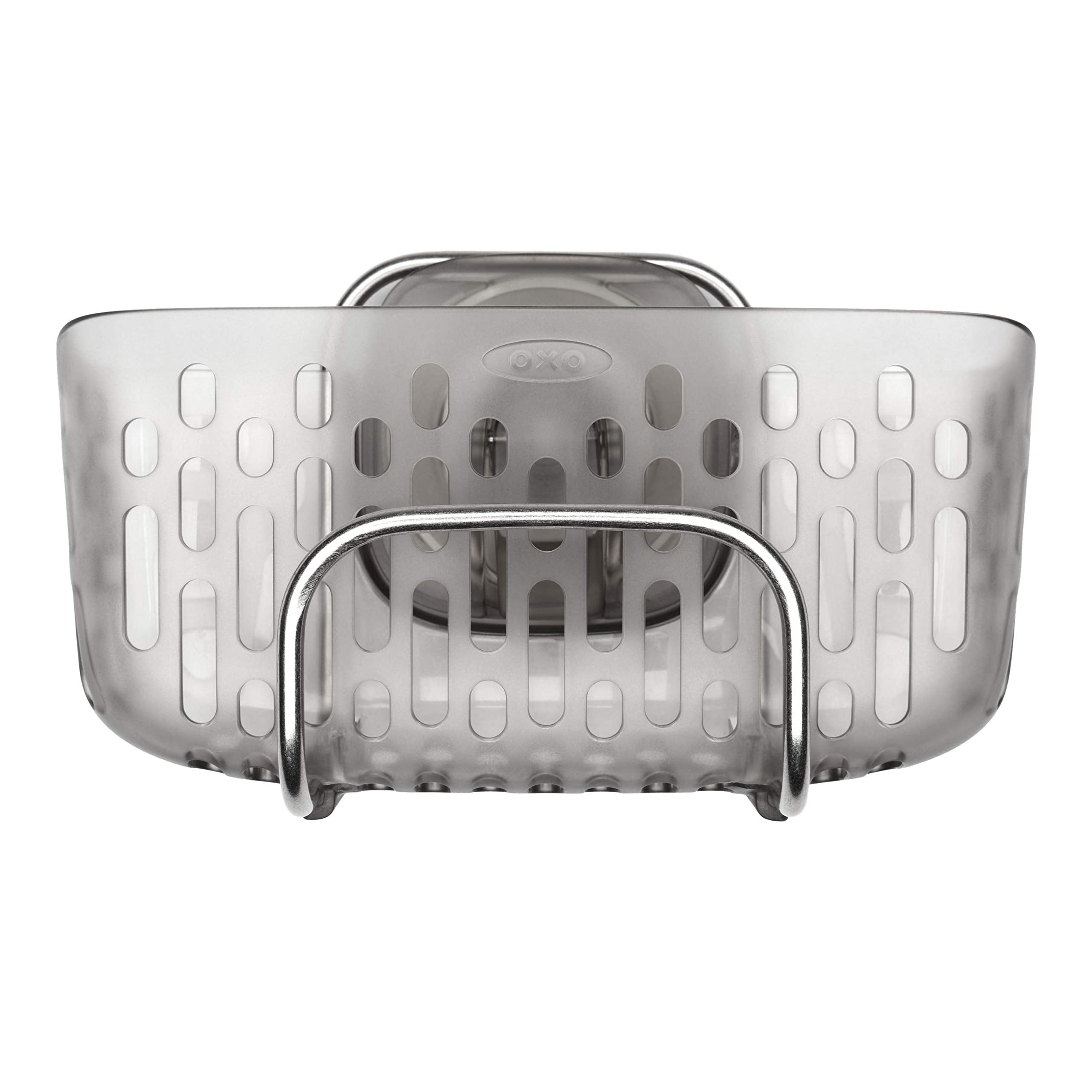 OXO StrongHold basket inside a sink keeps oversized sponges organized