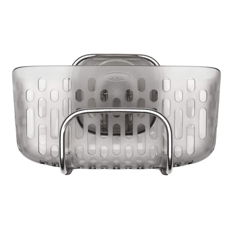 OXO StrongHold basket inside a sink keeps oversized sponges organized