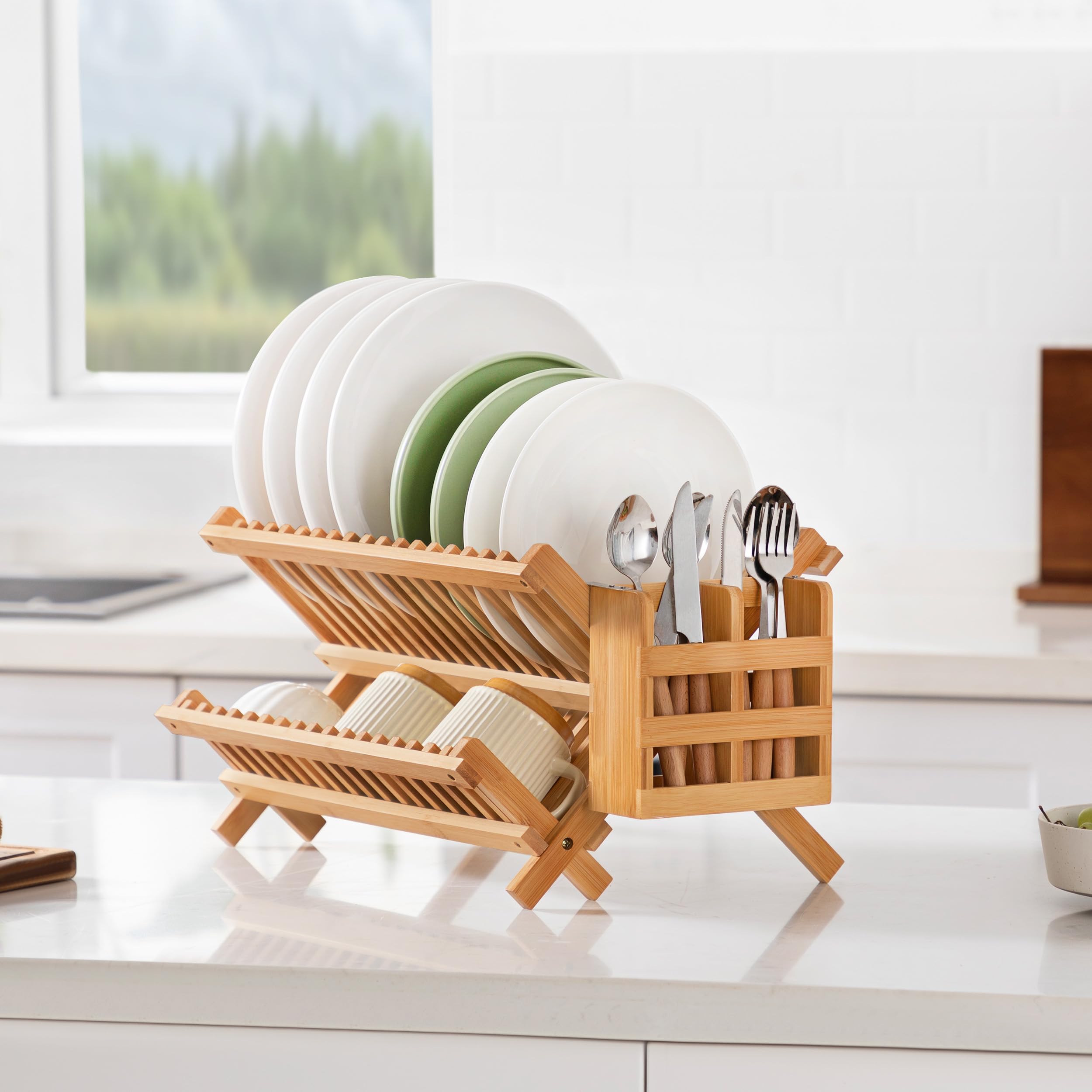 Oyydecor utensil holder with vents keeps utensils dry and organized.