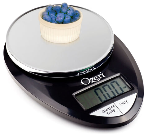 Ozeri Pro tare function shows net ingredient weight after zeroing the container.
