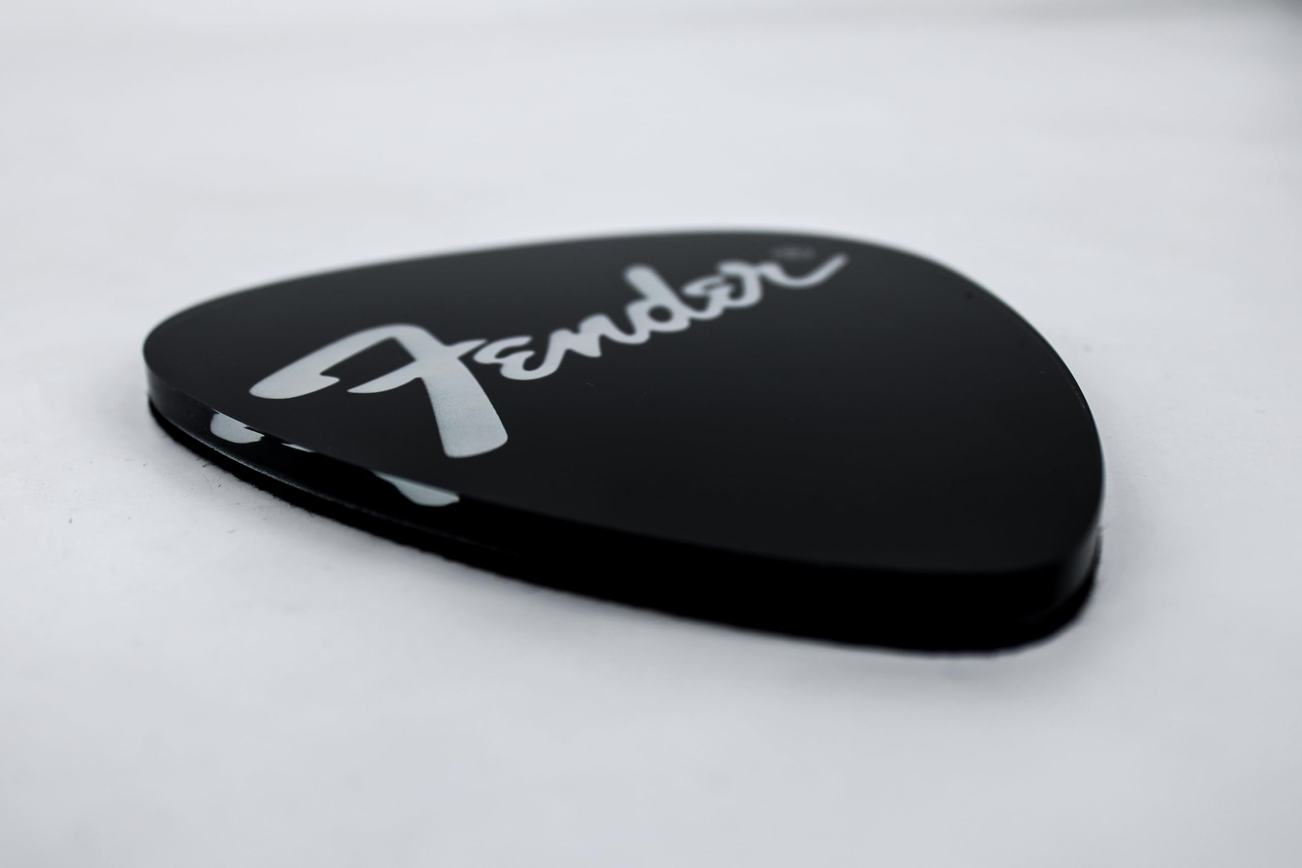 P Pluginz Fender guitar pick coaster design 1 close-up highlights reflective edges.