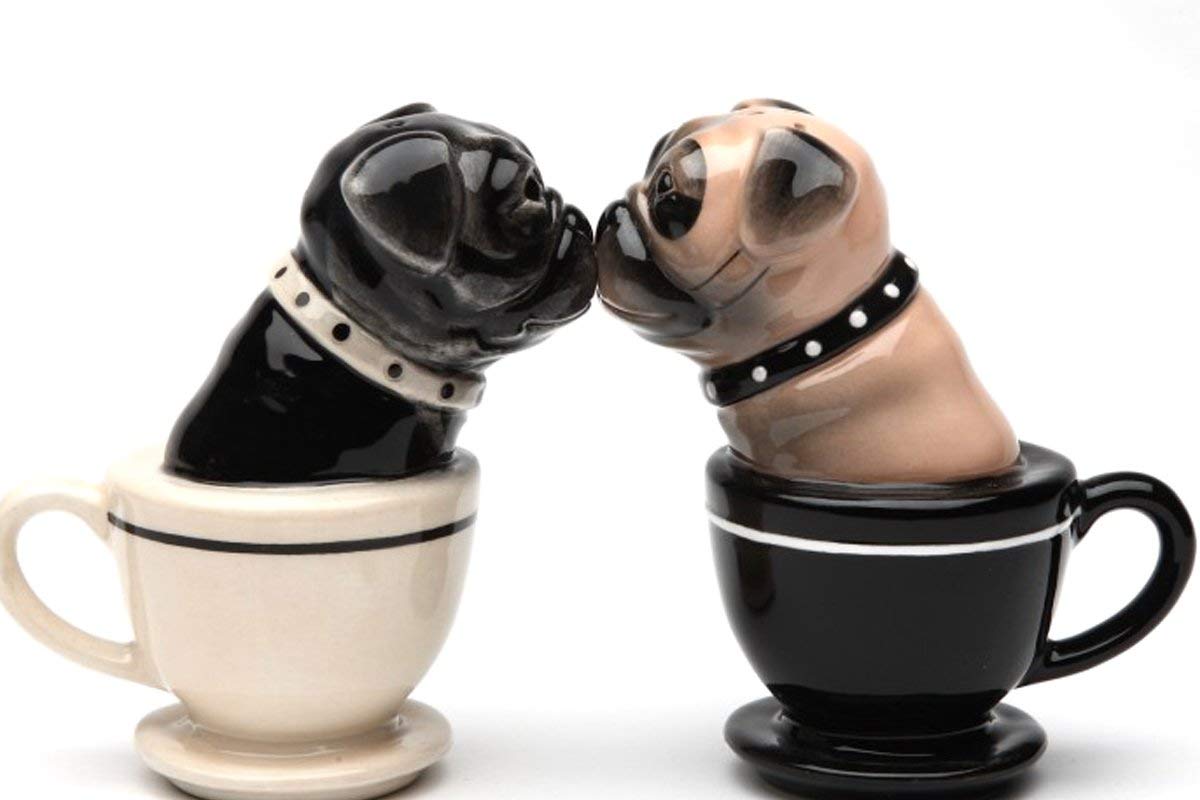 Pacific Giftware Tea Cup Pugs ceramic salt and pepper shakers on a decorative kitchen counter.