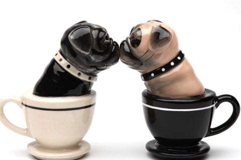 Pacific Giftware Tea Cup Pugs ceramic salt and pepper shakers on a decorative kitchen counter.