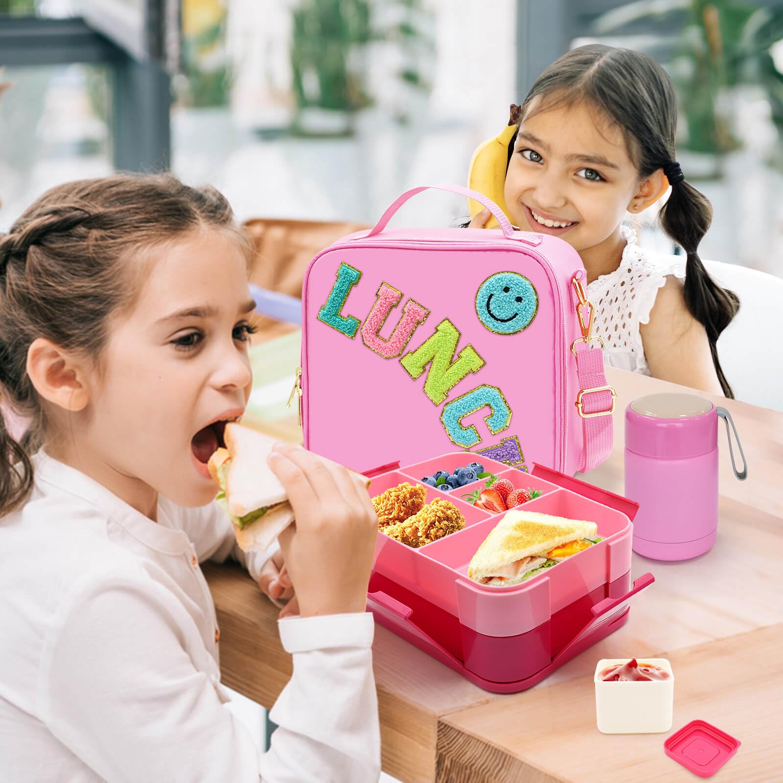 PainZieteg pink lunch box side view showing portable design for girls