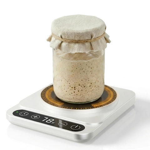 Pakusane Pro Sourdough Warmer Mat on counter keeping starter steady for consistent fermentation
