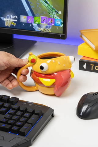 Packaging shot shows Paladone mug ready for gifting to Fortnite fans.