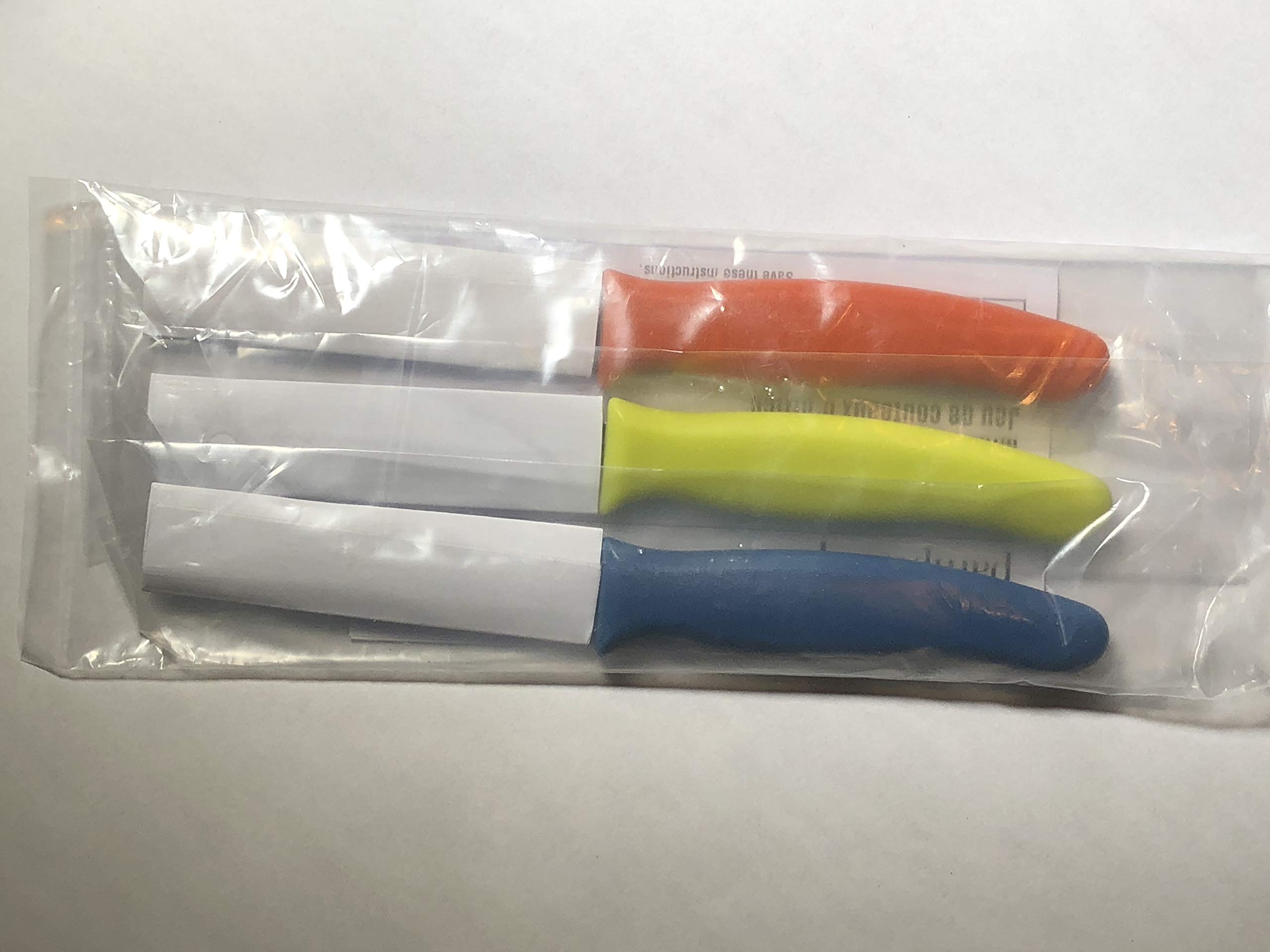 Pampered Chef 3-piece paring knife set collection showcases reliable performance for peeling and trimming.
