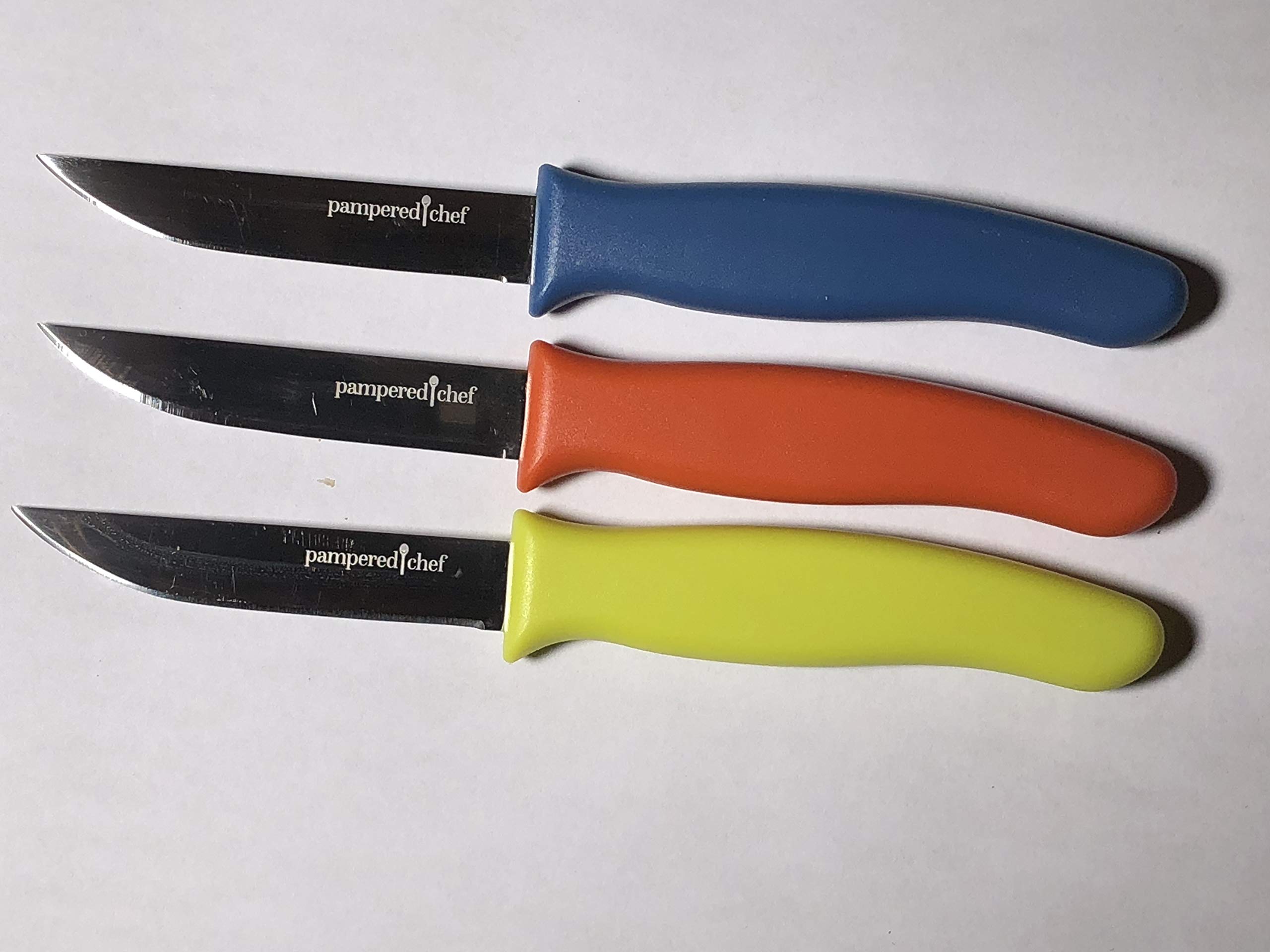 Pampered Chef 3-piece paring knife set main image shows versatile blades for precise peeling.