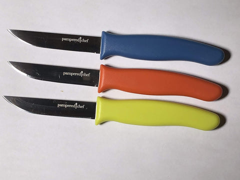 Pampered Chef 3-piece paring knife set main image shows versatile blades for precise peeling.