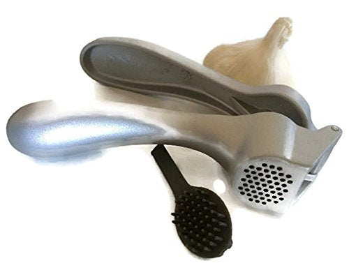 Pampered Chef garlic press in easy-squeeze action for garlic cloves