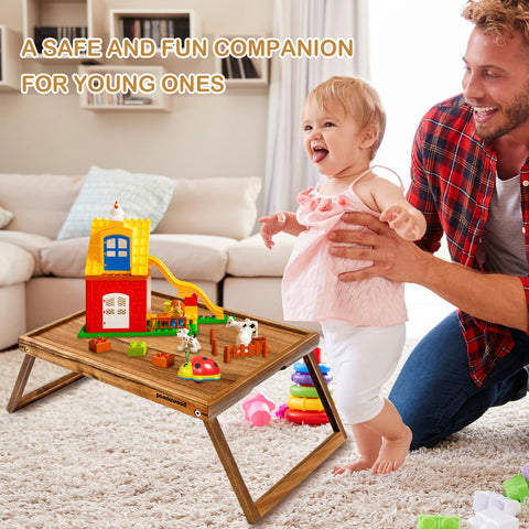 PANDAWOOD laptop-on-bed use shows a practical work surface from sofa or bed.