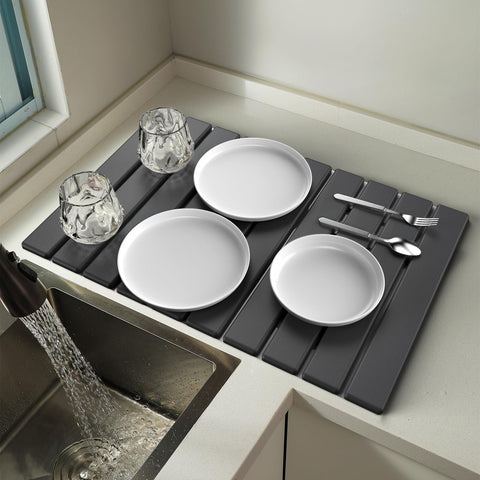 PantaArea stone drying mat unfolded on the counter, absorbs moisture quickly.