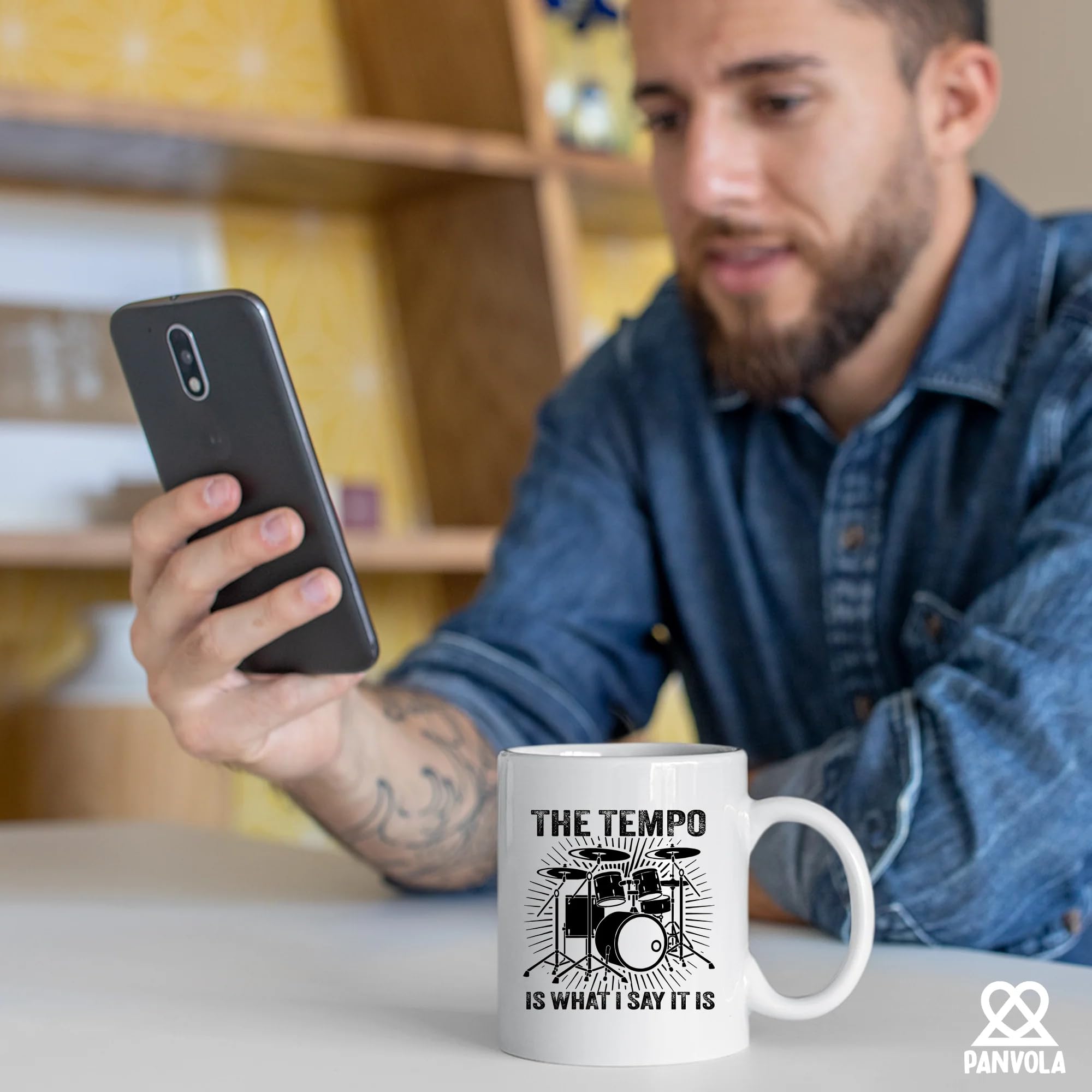 Panvola tempo mug held in hands for on-the-go music sessions