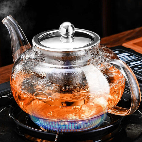PARACITY glass teapot on stovetop showing heat resistance and clarity