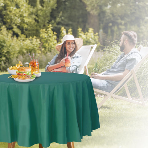 Party Dimensions disposable cover protecting a round table at a wedding reception