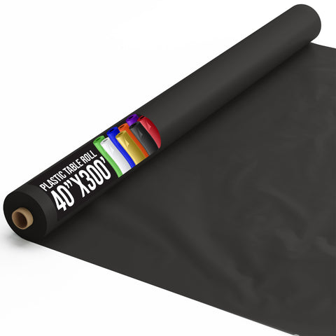 Party Solids Exquisite Black Rectangle Tablecloth Roll on dining table, protects against spills.