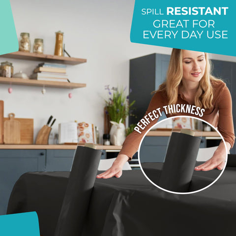 Party Solids Exquisite Black Rectangle Tablecloth Roll creates a clean, cohesive party backdrop.