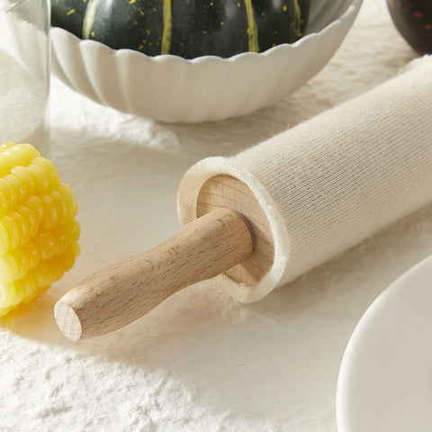 Patelai rolling pin cover shown with dough rolling to reduce sticking.