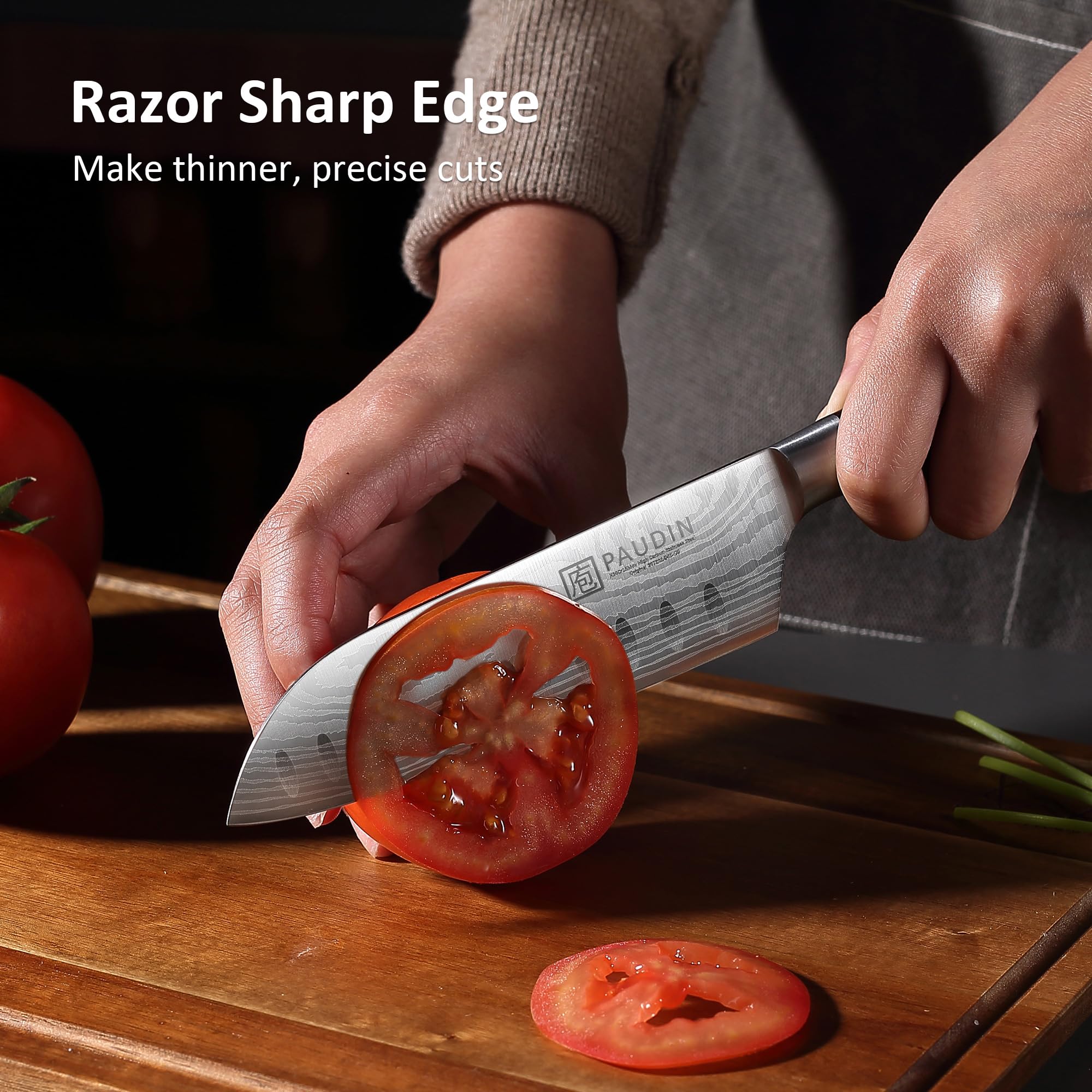 PAUDIN Santoku knife 5-inch chopping vegetables demonstrates controlled, smooth cuts.