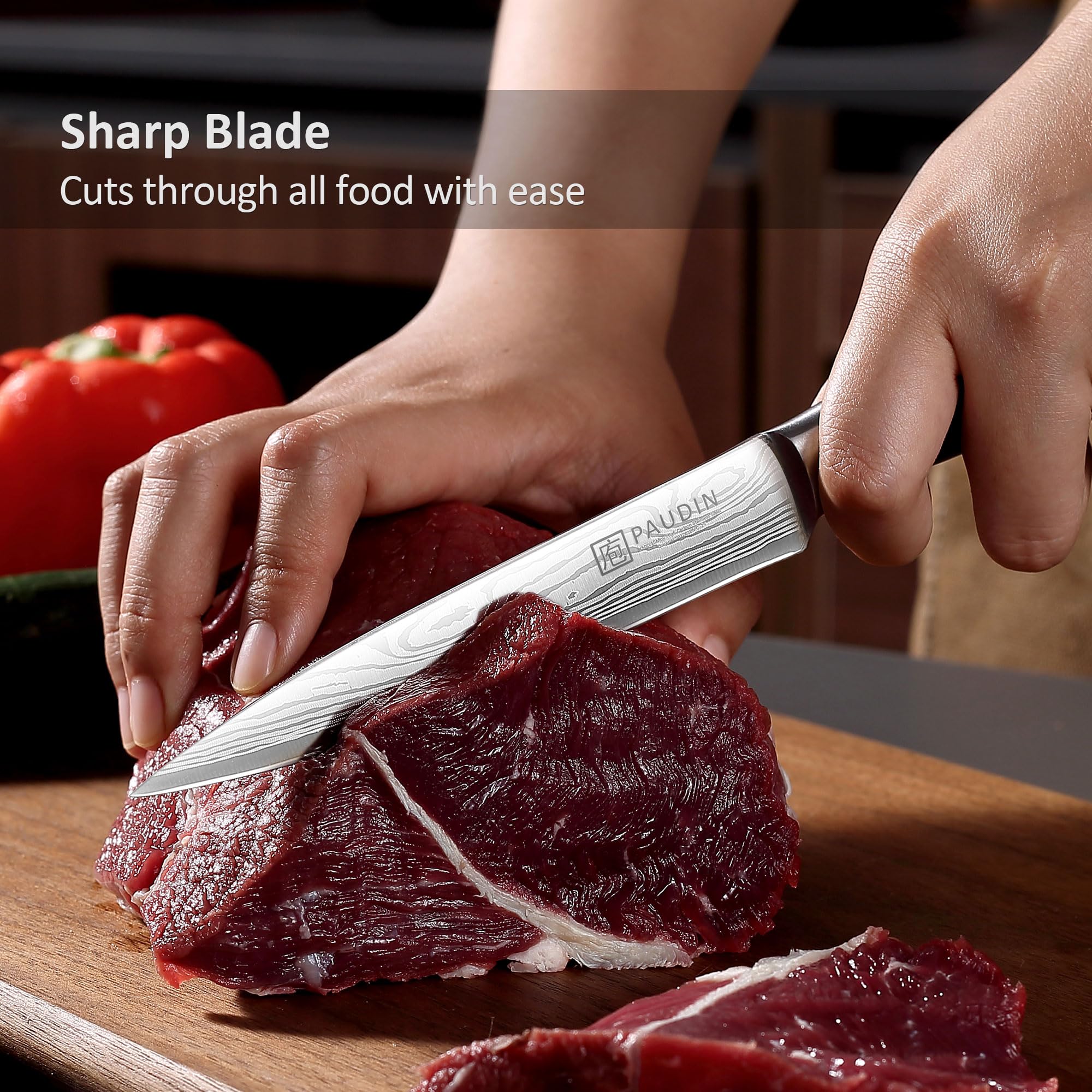 PAUDIN knife slicing fruit with clean, even cuts.