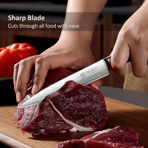 PAUDIN knife slicing fruit with clean, even cuts.