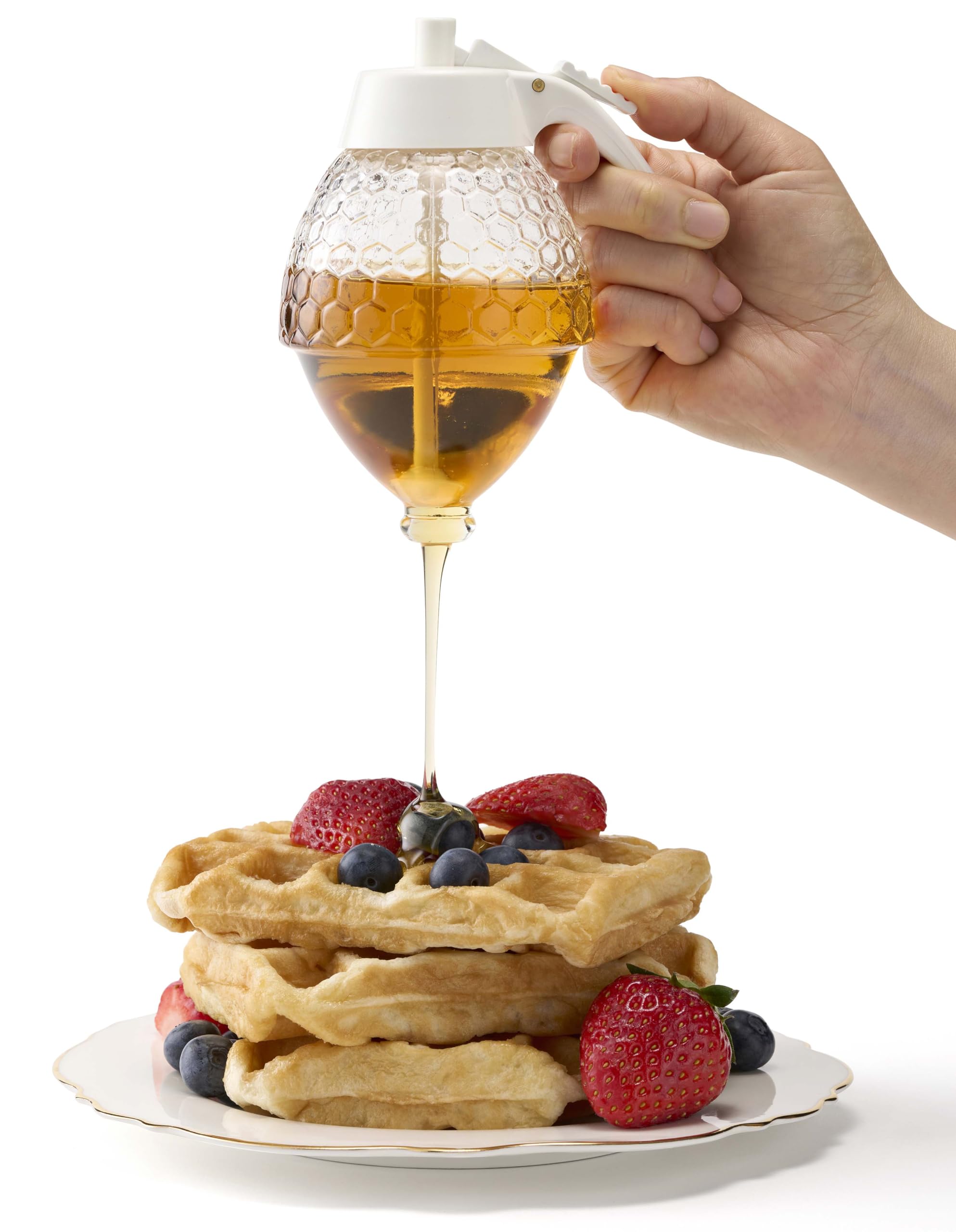 PAULSWAY honey dispenser with white lid enhances modern kitchen decor.