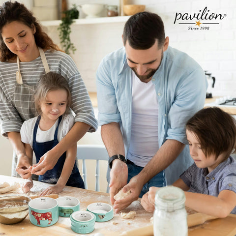 Pavilion Live Simply stackable teal measuring cups neatly nested on a countertop