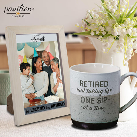Pavilion retirement mug securely packaged in die-cut box for gifting.